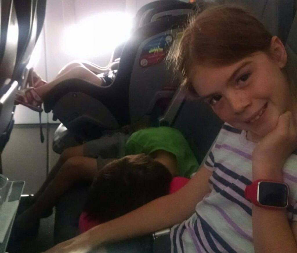 Kids and Car Seat on plane